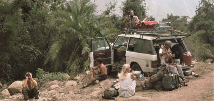 Members of the OSME expedition to Yemen in 1985 some watching birds others resting by their jeep